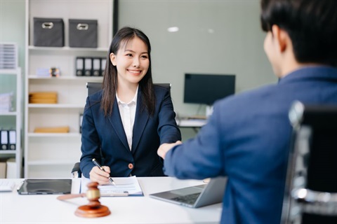 Business professional shaking hands